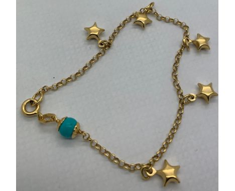 An 18ct and turquoise chain bracelet with star charms. Weight 4.5gm. 7cm length.Condition ReportGood condition.