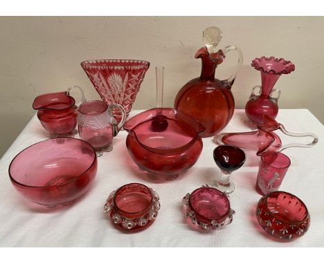 A selection of 19thC cranberry glass together with later ruby glass to include carafe with stopper a/f, salts , jug , vase et