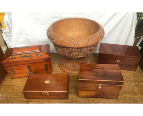 Three Victorian tea caddy's, one with mother of pearl inlay, one smaller box and a carved wood pedestal planter.Condition Rep