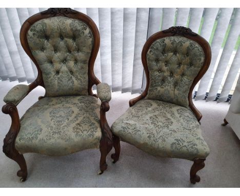 Two 19thC walnut framed chairs, one an open armchair, the other a nursing chair, both with button backed upholstery.Condition