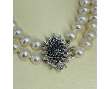 AKOYA CULTURED PEARL DOUBLE ROW NECKLACE, with sapphire and diamond chip clasp stamped '14K', 43cms long, in presentation box