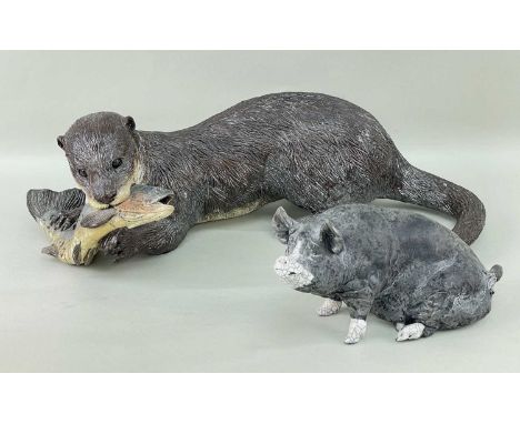 SALLIE WAKLEY (b. 1967) raku fired ceramic - otter with prey, 46cms long, together with similar seated pig, indistinctly sign