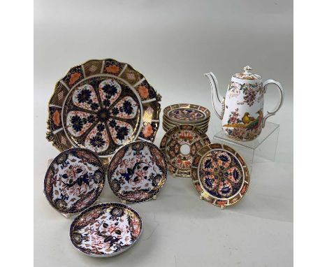 ROYAL CROWN DERBY IMARI PATTERNED SHALLOW BOWL, 23cms diameter, together with a collection of Imari patterned saucers in two 