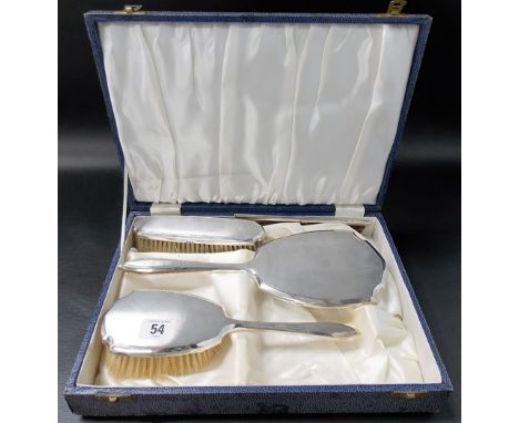 Silver engine turned four piece dressing table set by Mappin & Webb, comprising mirror, two brushes and a comb, London 1963 w