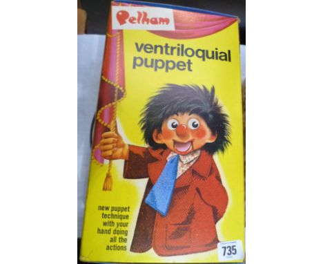 A vintage pelham ventriloquil puppet within original box