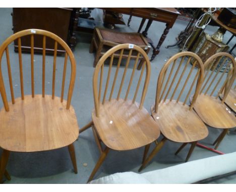 Set of four Blonde Ercol hoop and stick back dining chairs 