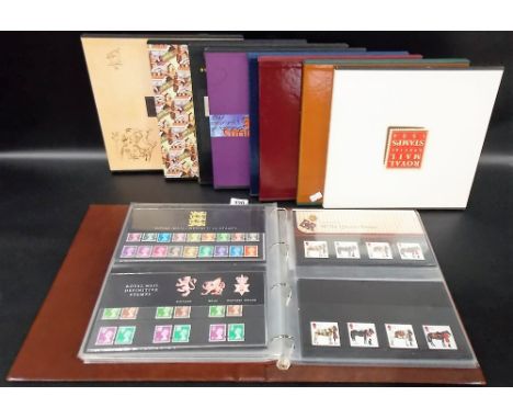 Album of First Day Covers together with eight Royal Mail special stamp books