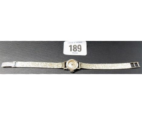 9ct white gold ladies Girard Perregaux manual wind  wrist watch, signed silver dial with baton markers within a circular case