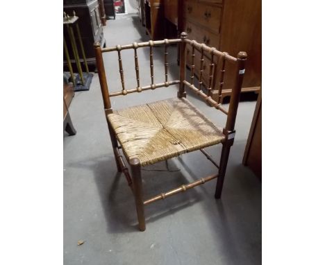 Bobbin and ring turned rush seat corner chair.