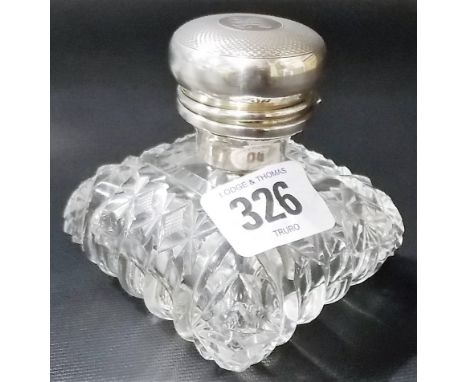George V silver and cut glass atomiser, the hinged engine turned ovoid lid revealing an atomiser over the squat square sectio