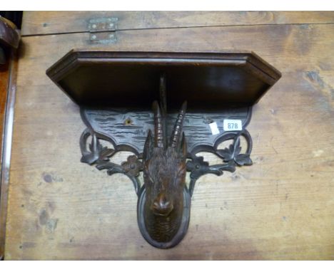 Black Forest carved pine wall bracket, carved with a goat head, height 10'