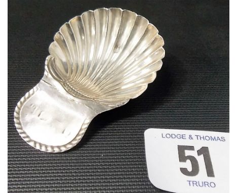 George III silver scallop shell bowl caddy spoon, Sheffield 1779 (soldered repair)