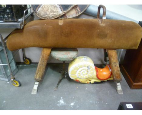 Vintage leather vaulting horse upon four wooden adjustable legs, length 62'