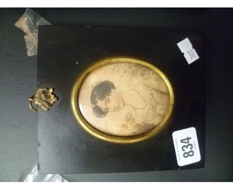 19th Century miniature school. Portrait of a young lady. Watercolour on paper. Oval, 3' x 2.5' within ebonised frame.