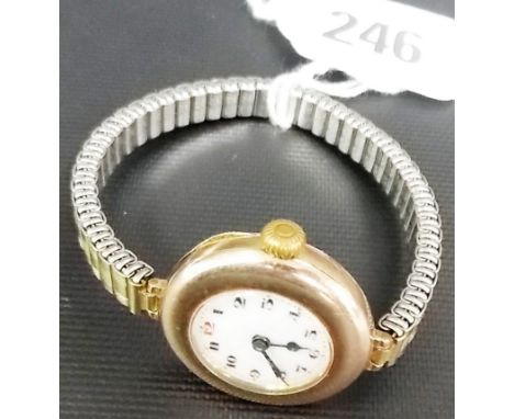 Early 20th Century 9ct gold manual wind wrist watch, the white dial with Arabic numerals, upon gold plated expanding bracelet