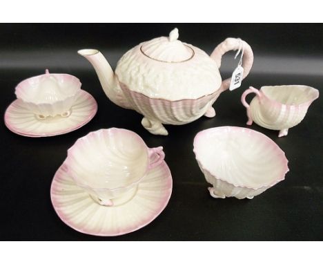 Belleek Neptune porcelain tea set for two, each shell moulded with naturalistic handles and pink blush painted, comprising te