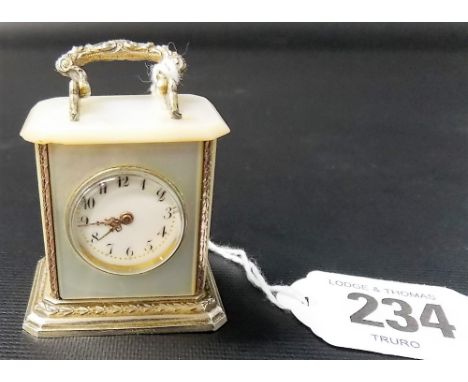 White metal and mother of pearl miniature carriage clock style time piece, the base stamped BREVET, height including handle 5