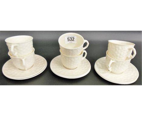 Set of six Belleek style fine porcelain basket and clover moulded coffee cups and saucers