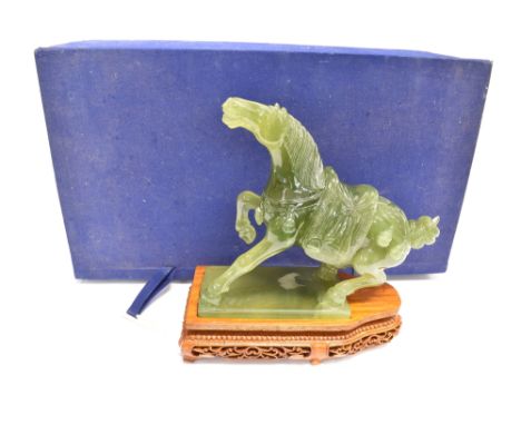 A BOXED CHINESE JADE CARVING  of a rearing horse, on hardwood stand, 25cm high overall