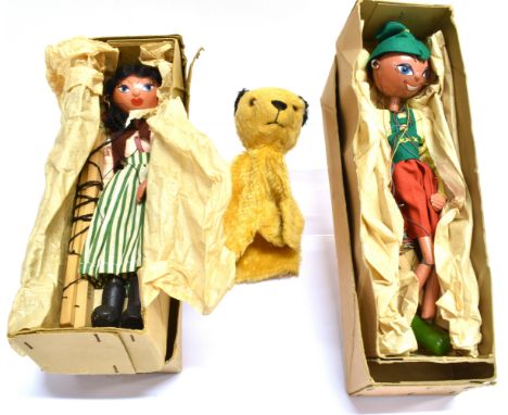 TWO PELHAM PUPPETS comprising a Pirate Woman and a Tyrolean Boy, each boxed, in a brown box with a red, white, blue and grey 