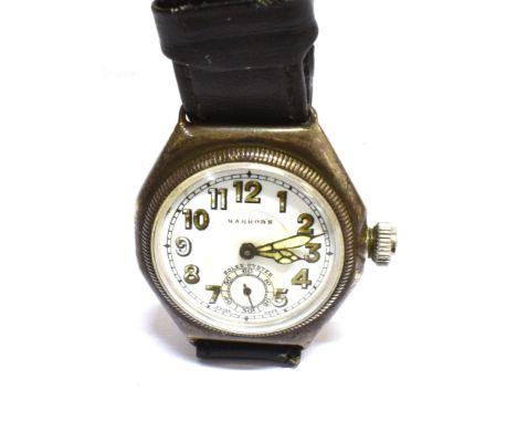 ROLEX OYSTER, A MID-SIZE TONNEAU SHAPED WRIST WATCH CIRCA 1928, REF 5620 the white enamel dial signed 'Harrods' and with lumi