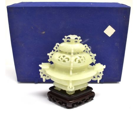 A BOXED CHINESE JADE CARVING  of a lidded vase relief with dragon mask handle, with hardwood stand, 20cm high overall