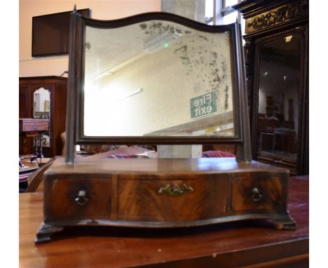 A MAHOGANY DRESSING TABLE MIRROR  the serpentine front base fitted with three drawers, on ogee bracket feet, 51cm wide 47cm h