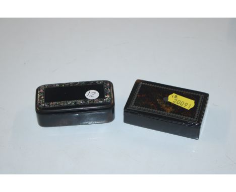 A Victorian mother of pearl inlaid snuff box and another snuff box