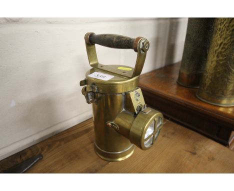 A brass CEAG inspection lamp