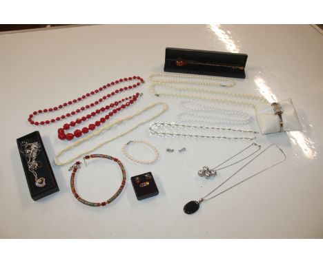 A box containing a ladies Rotary wrist watch with box, white metal necklaces, and various costume jewellery 