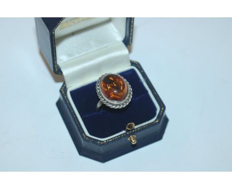 A vintage Sterling silver and amber set ring 