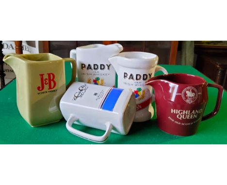Advertisement - Paddy Irish Whiskey water jugs; J&amp;B Scotch by Wade; Highland Queen by Wade and Canadian Club by Seton Pot