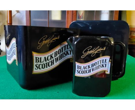 A Gordon Grahams Black Bottle Scotch whisky ice bucket and Wade water jug (2) Excellent Condition.