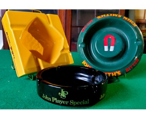 Smoking Advertisement - three mint condition ashtrays including John Smiths Bitter branded circular example by Wade; a John P