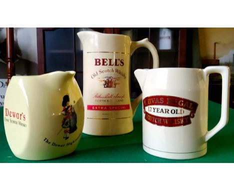 Whisky Advertisement - a Bell's Old Scotch Whisky 'EXTRA SPECIAL' water jug by Wade; Dewar's Fine Scotch whisky water jug by 