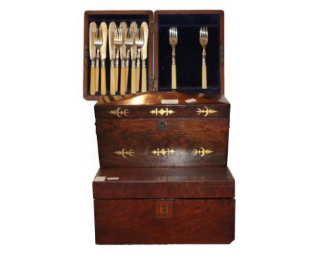 A Regency brass inlaid rosewood tea caddy (with brass paw feet retained inside), a mahogany cased set of six silver plated fi