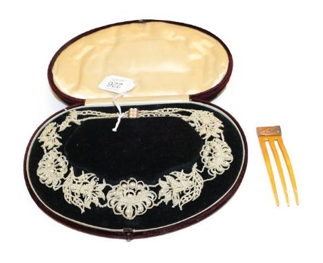 A seed pearl necklace, cased (a.f.) and a French hair comb decorated with rose cut diamonds, cased (2)