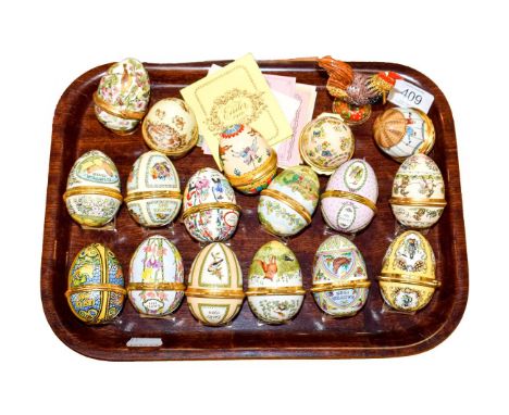 A quantity of Halcyon Days Bilston &amp; Battersea enamel easter egg boxes, some with certificates (one tray)