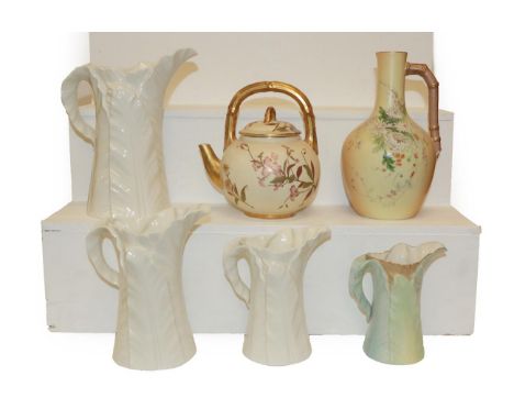 A Royal Worcester blush ground aesthetic movement kettle, a similar ewer and four palm leaf moulded jugs (one tray)
