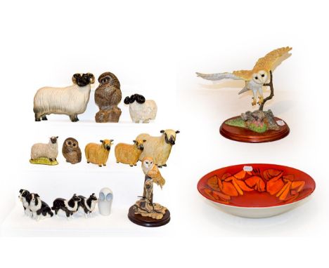 A Poole pottery Delphis bowl, together with a Border Fine Arts barn owl, Beswick collies, model sheep and three boxes of hous