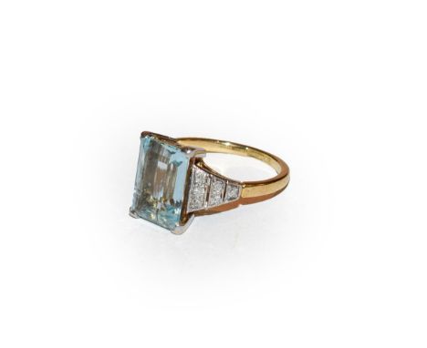 An aquamarine and diamond ring, the step cut aquamarine in a white four claw setting, to an eight-cut diamond set shoulder ye