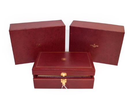 Patek Philippe inner and outer watch boxes with booklets and paperwork holder wallet, together with another Patek Philippe ou