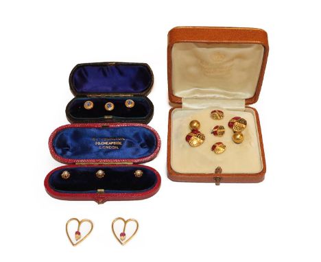 Three pearl dress studs, cased, three enamel dress studs, cased, a pair of gilt metal cufflinks and matching dress studs, cas