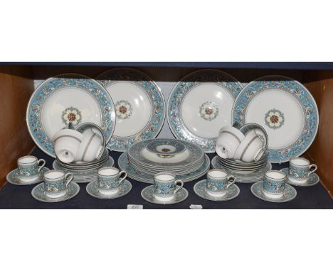 A Wedgwood Florentine pattern part service including, dinner plates, dessert plates, teacups, saucers and side plates, coffee