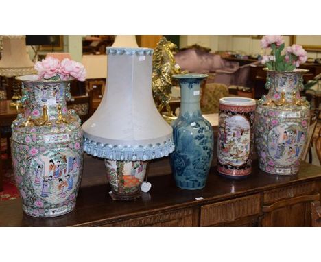 A large pair of decorative Cantonese style vases together with a similar table light, blue and white baluster jars and a stic