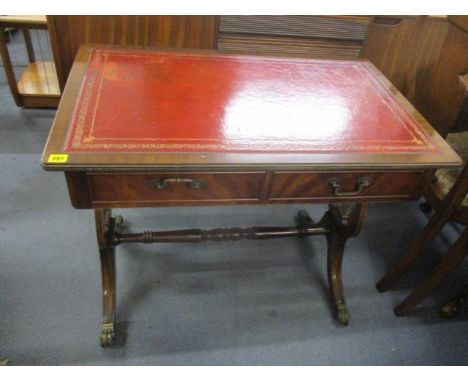 A mid 20th century Regency inspired mahogany, twin drawer sofa table with lyre shaped ends, 29" h, 35" w 