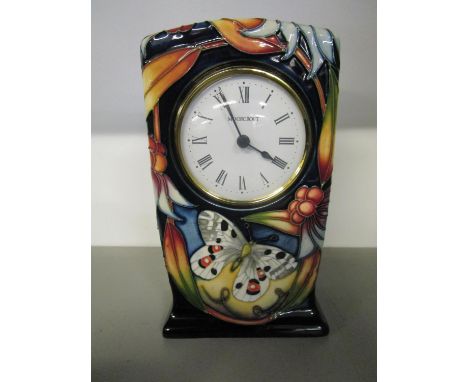 Moorcroft Apollo mantle clock designed by Sian Leaper, decorated with a butterfly and flowers, 6 2/8"h 
