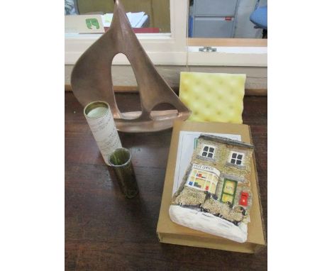 Collectibles to include an Isle of White glass vase, a model boat and a pottery view of a cottage 