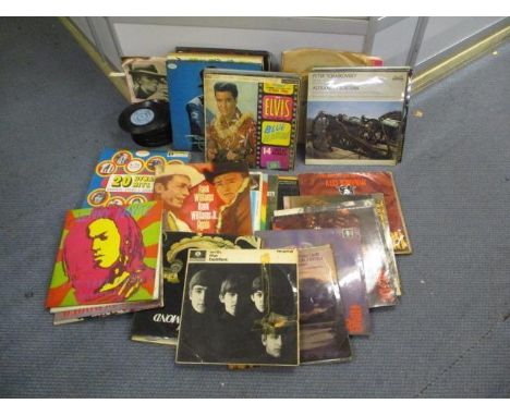 A selection of 45s and 33 rpm records to include David Bowie, ABBA, Elvis and Top of the Pops, '79 