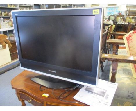 A Panasonic Viera LCD, 25" television, model TX-26LXD70, with instruction manual 